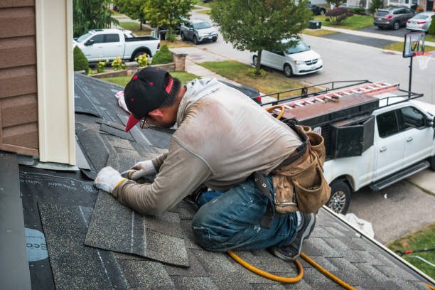 Professional Roofing technician working in DeForest, WI